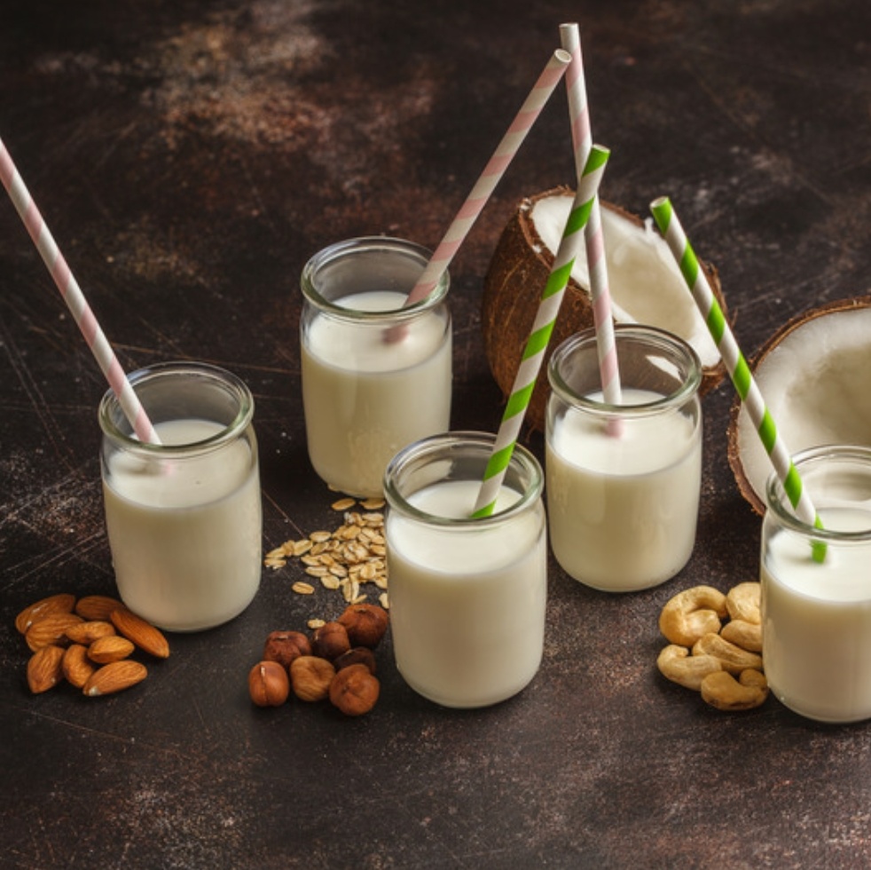 Nut milk glasses with nuts
